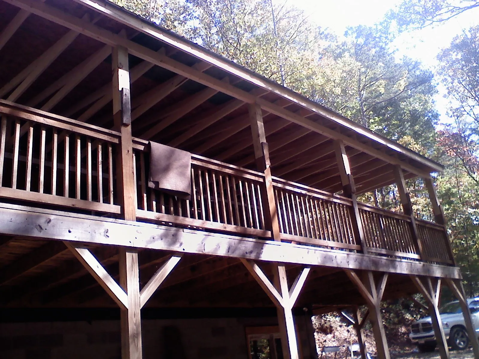 Timber framing under a new elevated porch and deck — Roof Leak Repair in Bunker Hill by Roofing Brothers